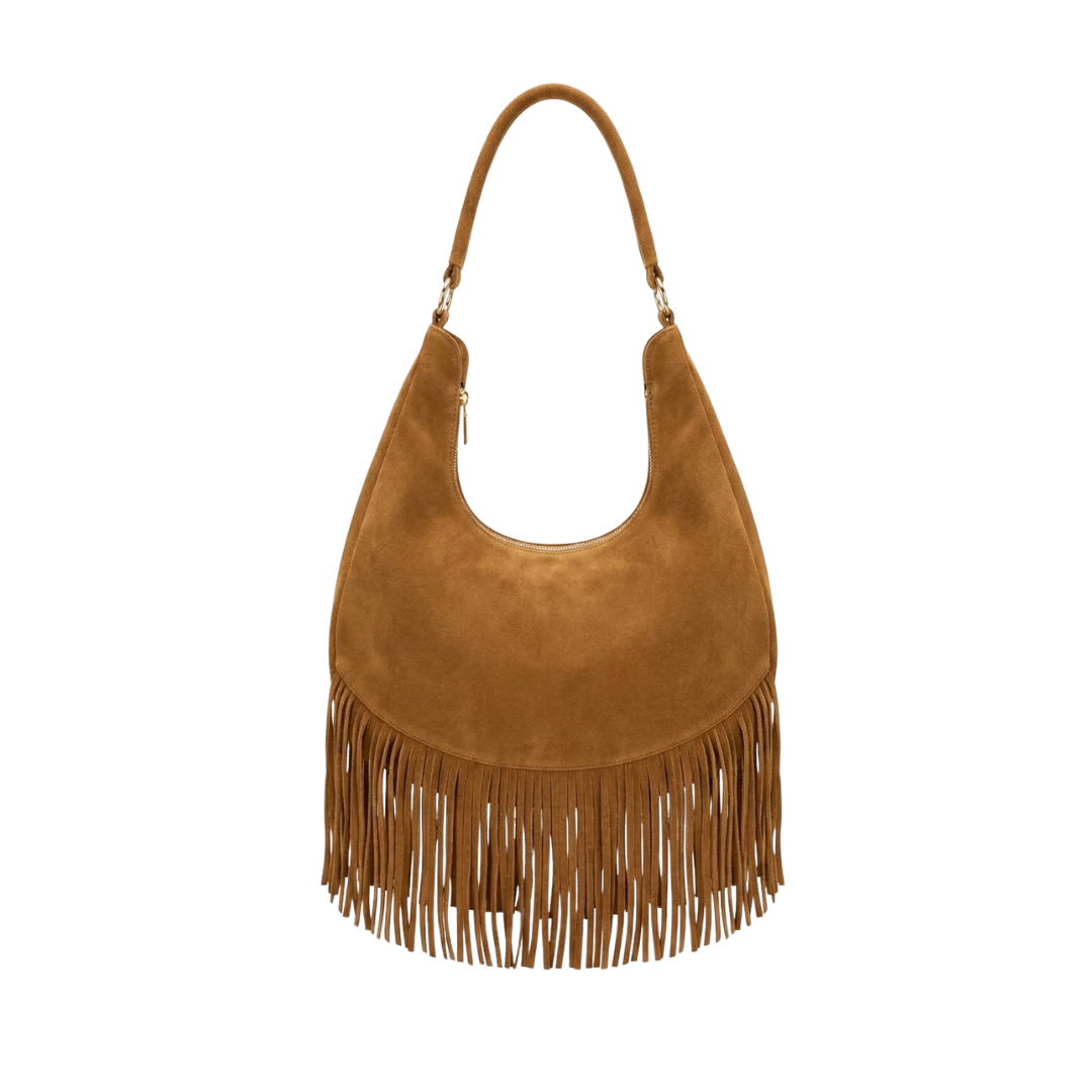 Zaza Bag es Confeccionada artesanalmente en León, Guanajuato, 100% piel con textura de gamuza y un diseño de flecos que aporta dinamismo y elegancia bohemia. Su diseño espacioso incluye compartimentos internos para un orden impecable y una correa perfecta para llevar al hombro con total comodidad.

Especificaciones del producto:

Material exterior: 100% piel vacuna (acabado en gamuza)

Detalles: Flecos frontales de piel y herrajes metálicos

Interior: Amplio compartimento principal con bolsillos internos de